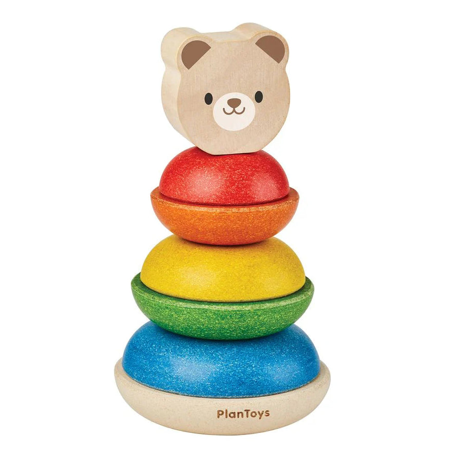 Stacking toy with bear-shaped top on a white background, from PlanToys.